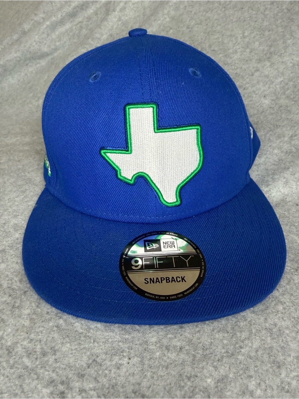 New Era Royal Blue Dallas Snapback Hat with White Texas Patch and Green Trim